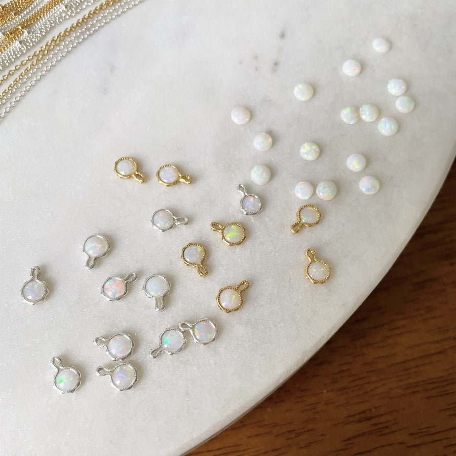 Australian opal pendants in gold and sterling silver made from Coober Pedy South Australian opals for personalised jewellery