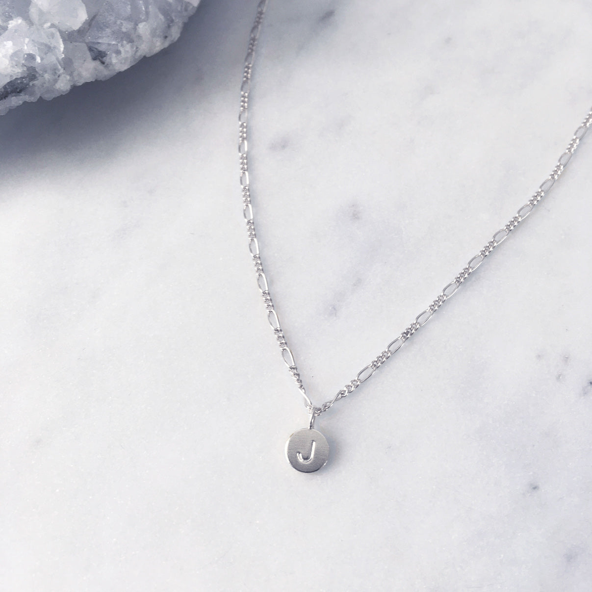 Personalised Sterling silver figaro necklace with a round silver initial pendant