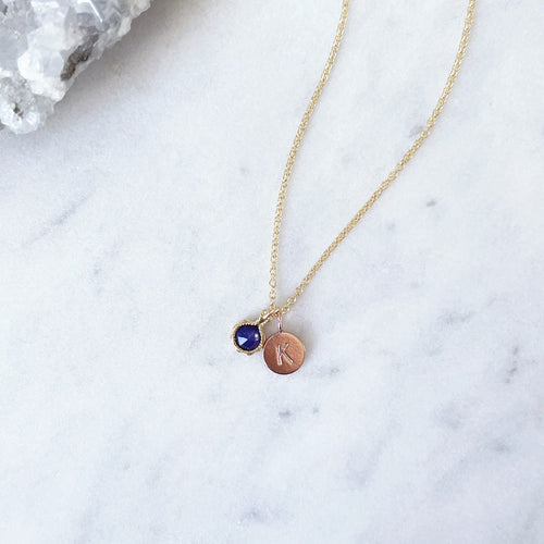 Blue sapphire necklace with a rose gold letter pendant