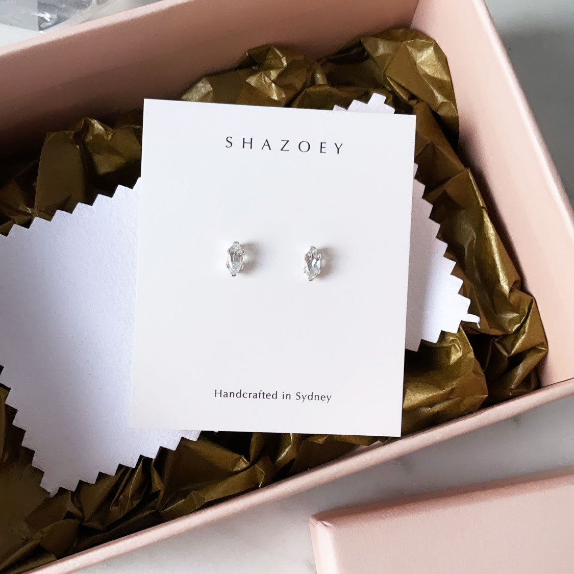 White topaz marquise gemstone studs in sterling silver