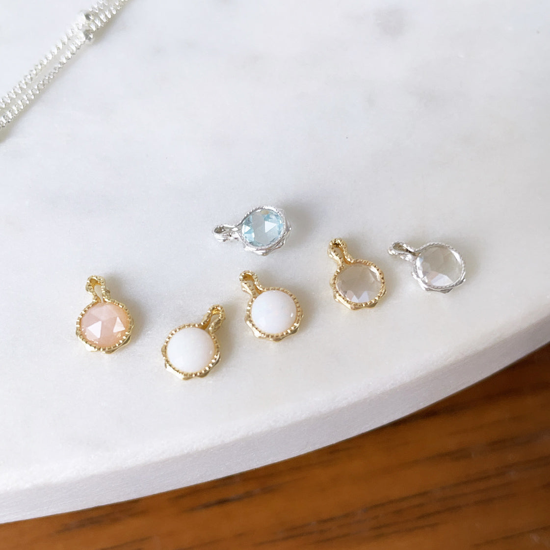 Birthstone pendants with genuine gemstones such as Australian opal, aquamarine and moonstone in gold and sterling silver