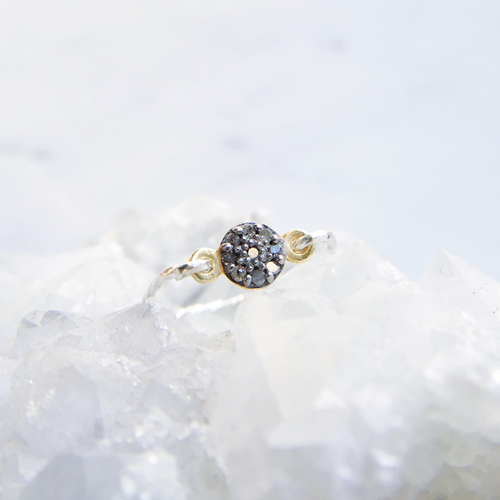 Modern diamond ring with small pavé rough diamonds on a twisted sterling silver band handmade in Australia