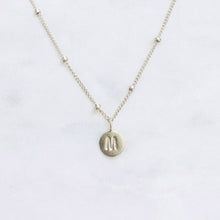 Personalised sterling silver initial necklace with custom letter pendant on a minimalist sterling silver dot chain