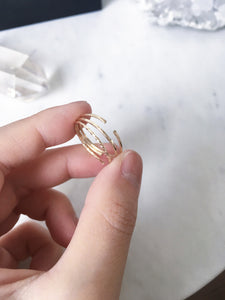 A set of 3 simple, hammered and twisted minimalist gold rings