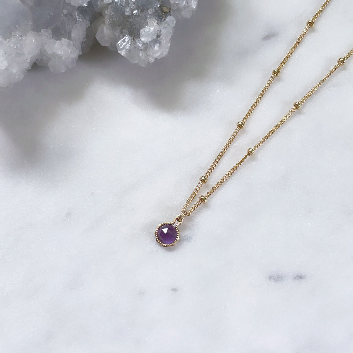 February birthstone amethyst pendant on a fine gold chain Australian personalised jewellery 
