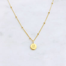 Custom letter initial pendant on a gold satellite chain