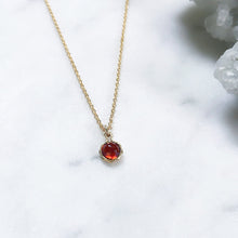 Faceted red garnet January birthstone necklace in gold