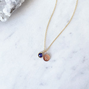 Blue sapphire necklace with a rose gold letter pendant