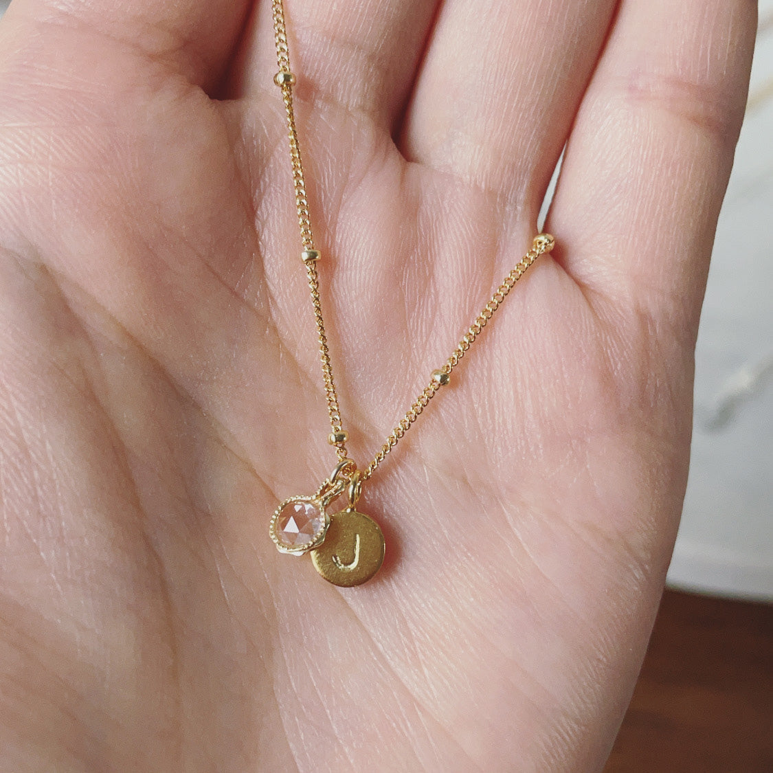 White topaz necklace in gold for April birthstone jewellery