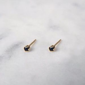 Tiny black gemstone studs in gold- black spinel gems