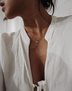 Jyslakay wears the SHAZOEY rose gold initial necklace in the length 16" 