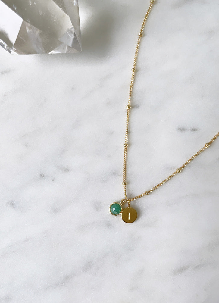 Gold emerald necklace with gold initial charm personalised necklaces Australia 