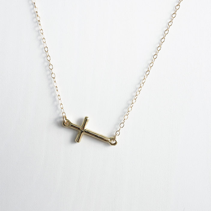 Personalized sideways cross necklace with your family birthstones in 10K,  14K or 18K solid gold.
