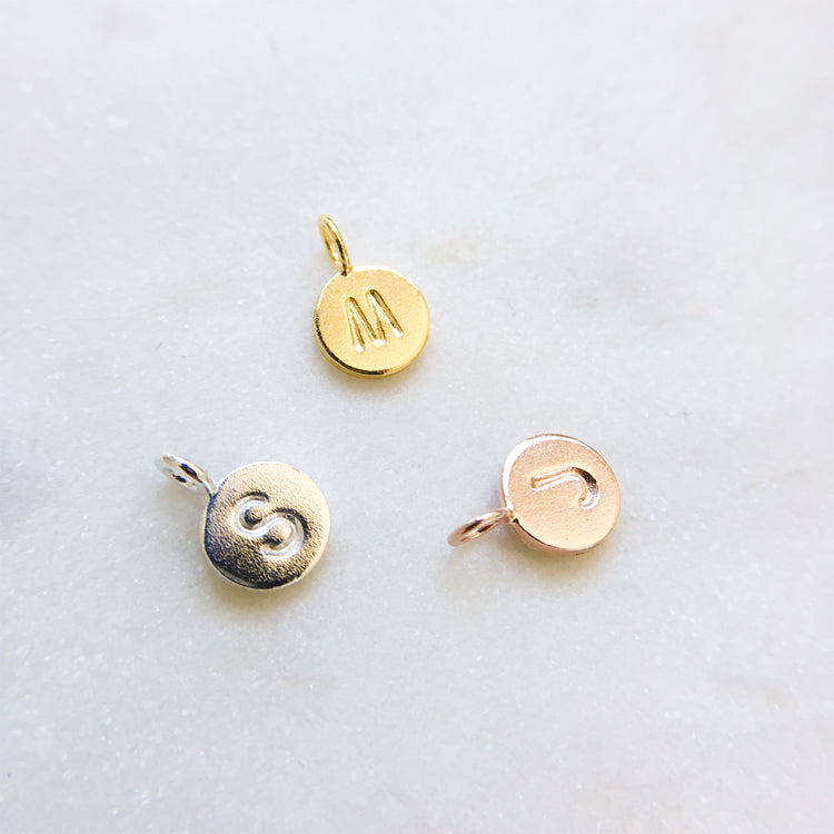 Custom letter initial disc pendants for necklaces in gold, sterling silver and rose gold 
