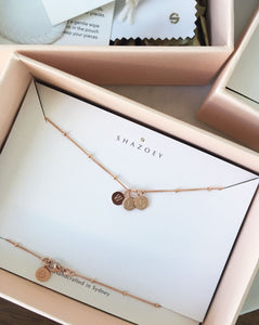Personalised rose gold initial necklace in pink box