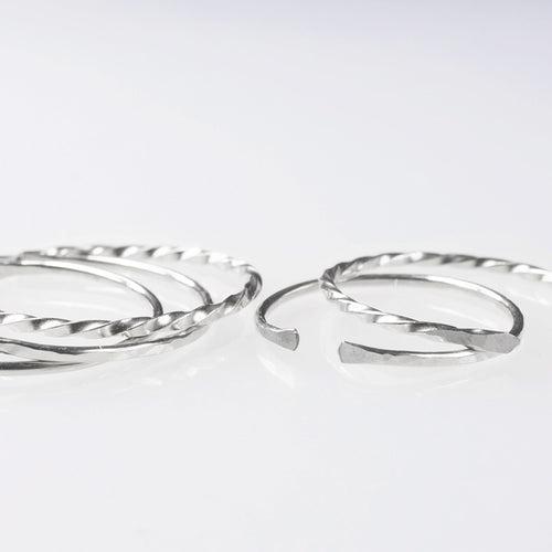 Set of 5 handmade thin sterling silver ring bands in a classic, hammered and twisted finish